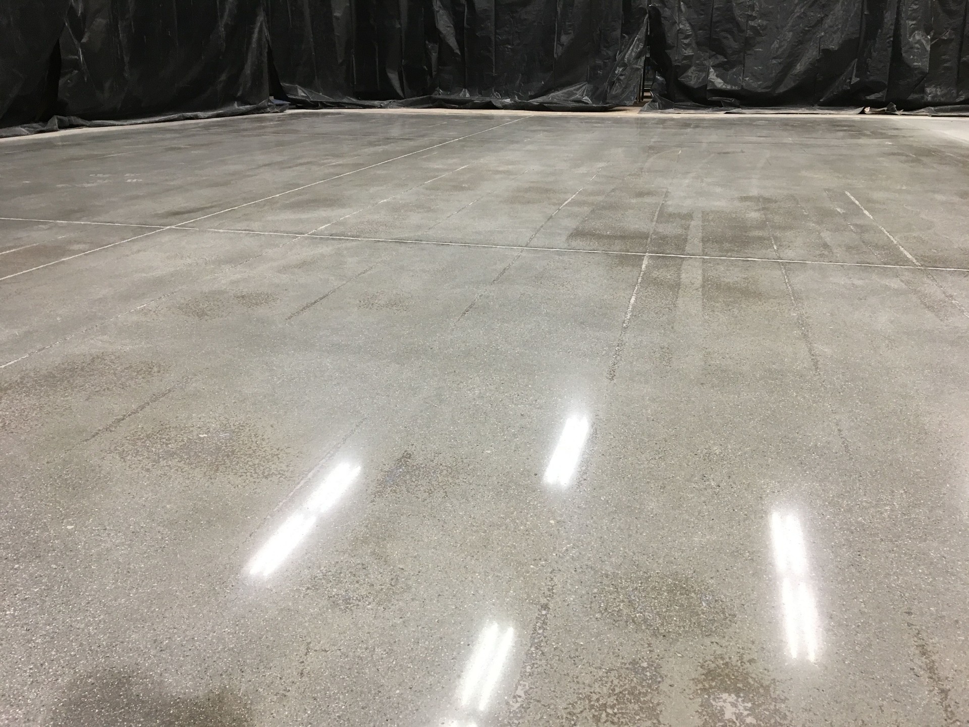 Section of Polished Concrete Floor During Overnight Store Remodel
