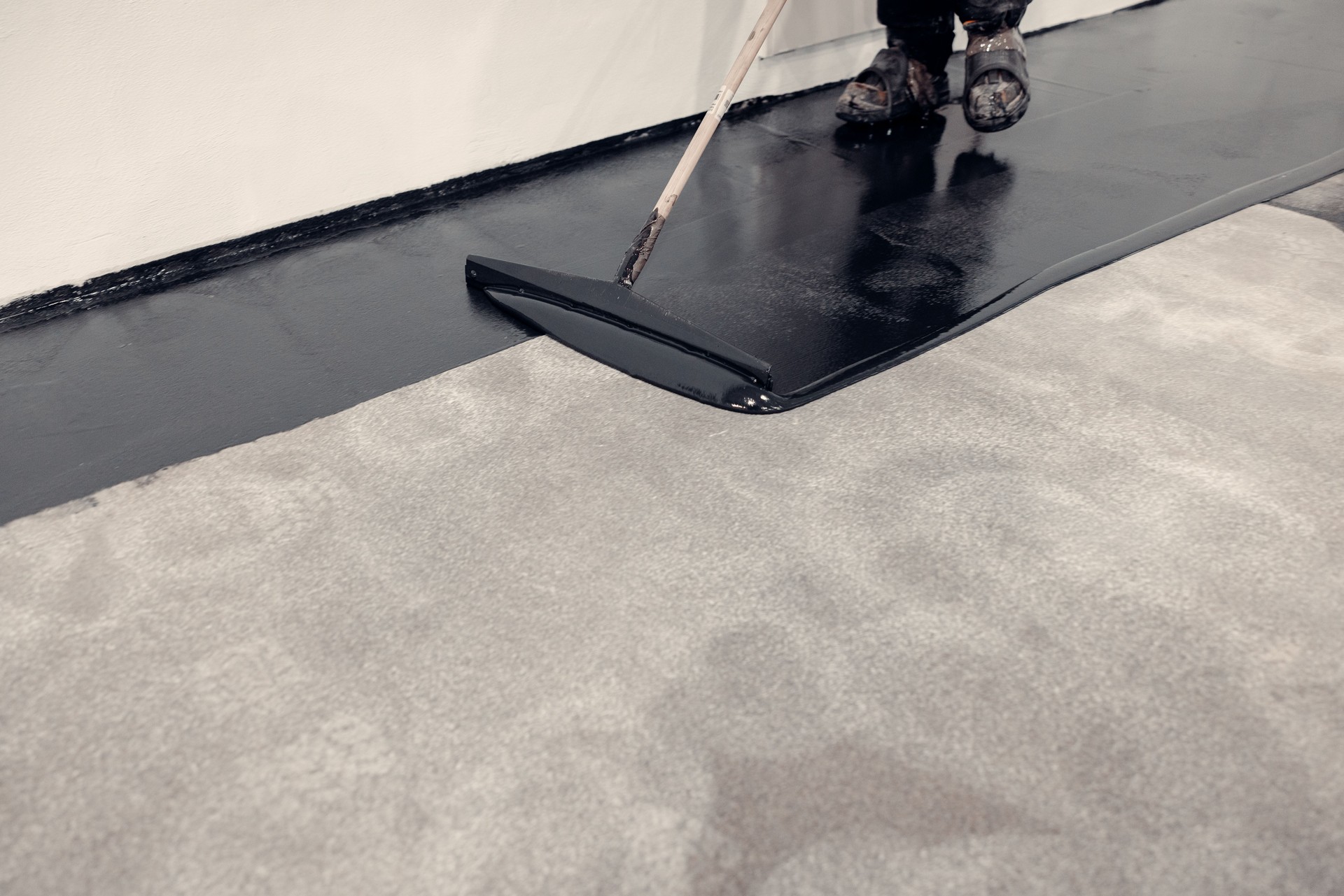 Close-up shot for epoxy resin application in black colour.